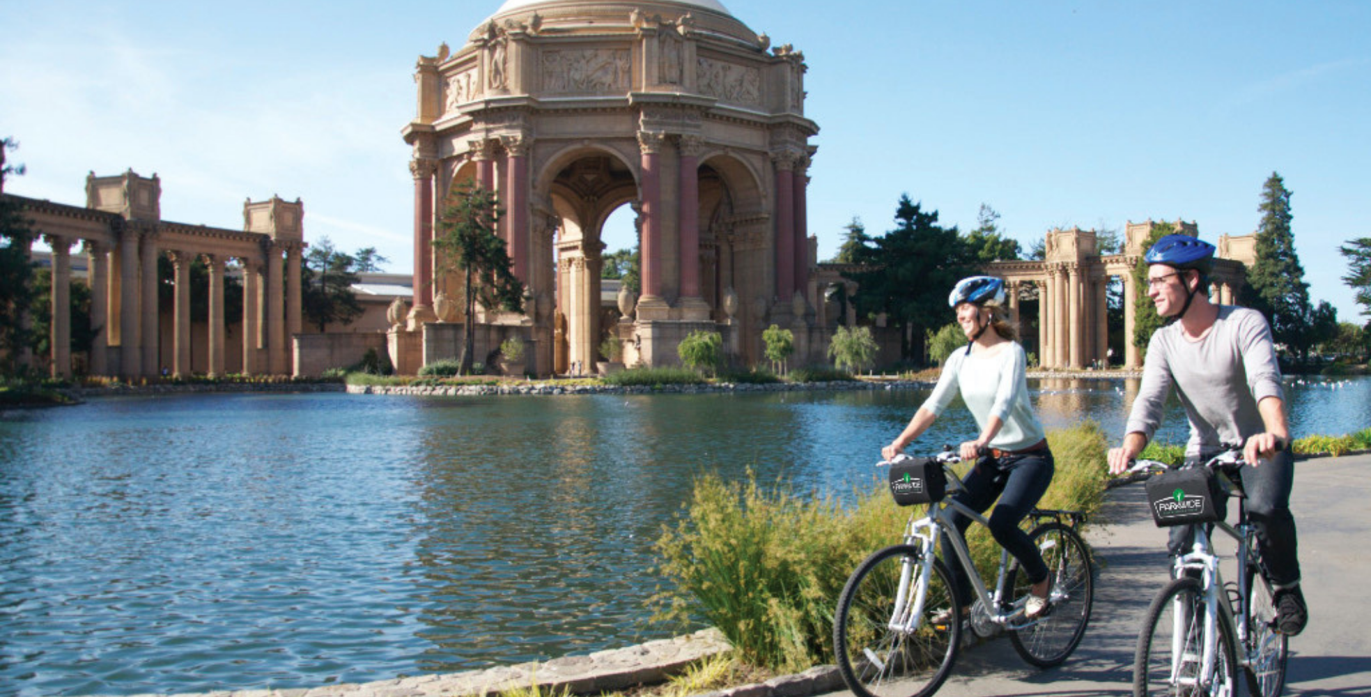 couple biking the sf marina district on bike rentals